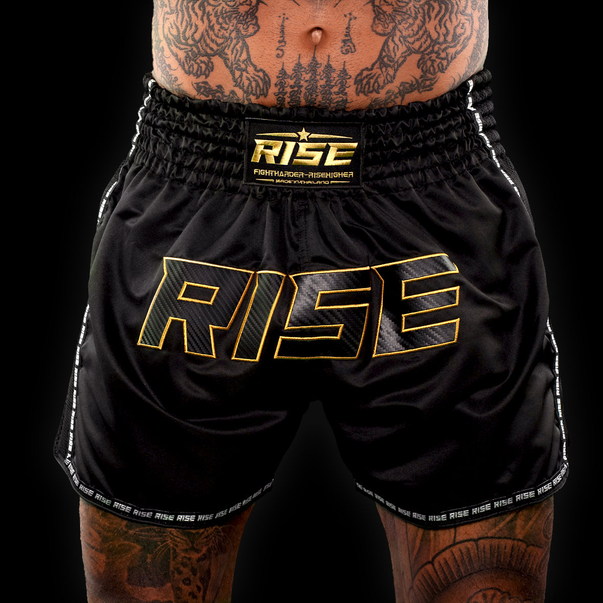 'BLACKOUT' MUAY THAI SHORTS (GOLD STITCH)