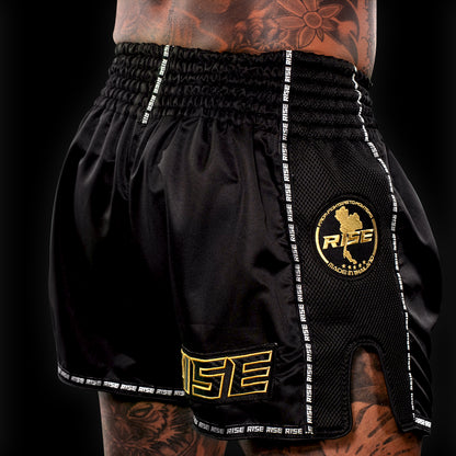 'BLACKOUT' MUAY THAI SHORTS (GOLD STITCH)