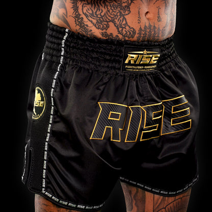 'BLACKOUT' MUAY THAI SHORTS (GOLD STITCH)