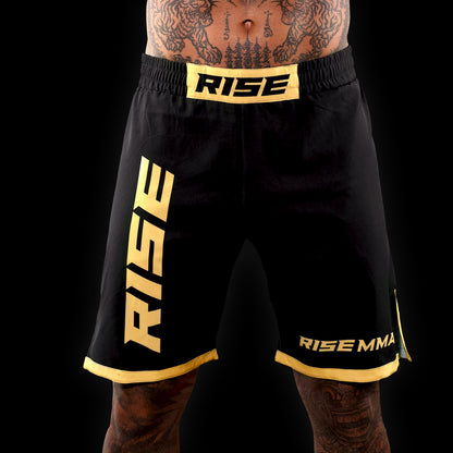 RISE MMA SHORTS (BLACK/GOLD)