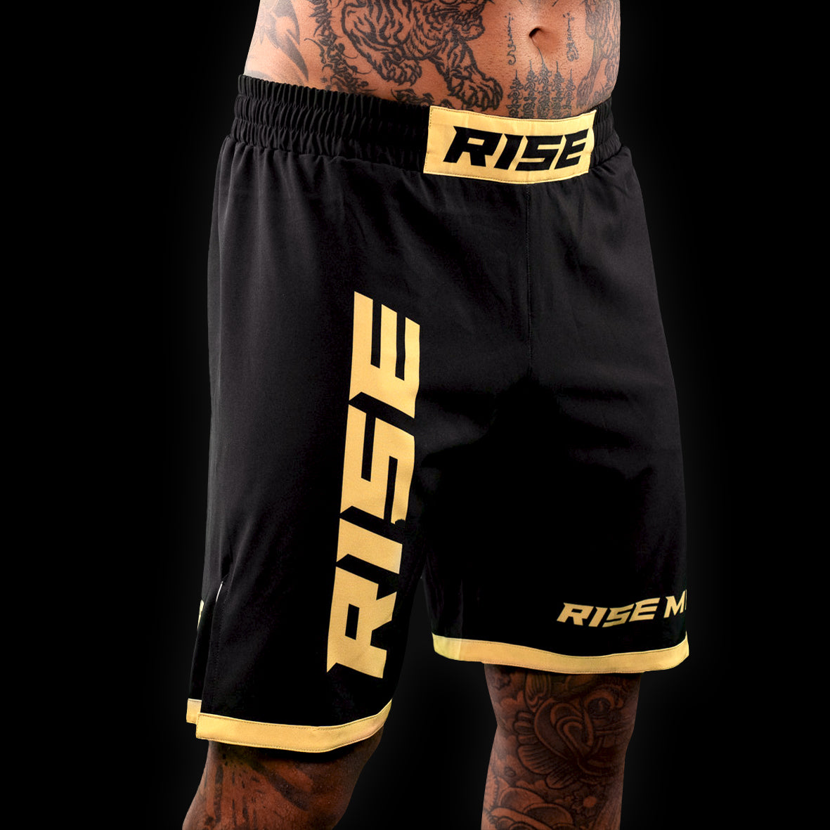 RISE MMA SHORTS (BLACK/GOLD)